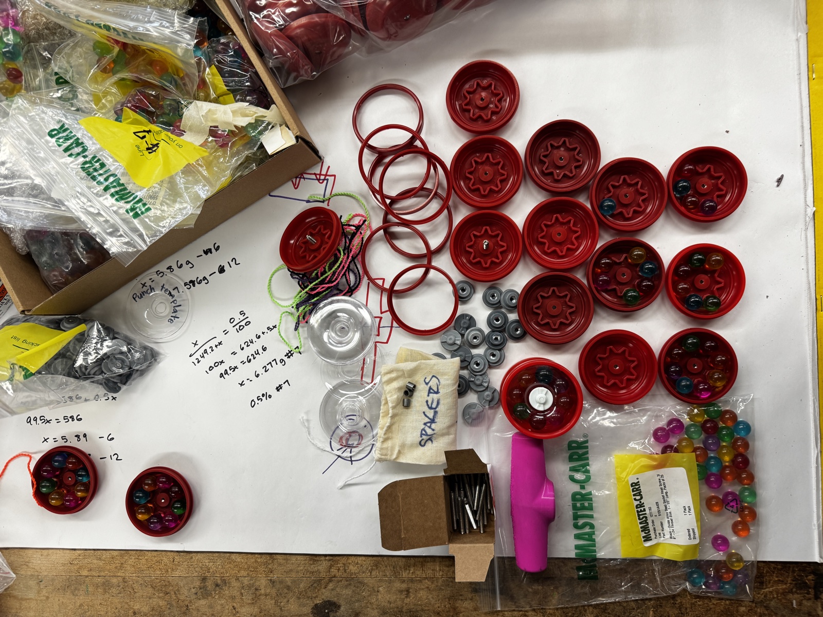Partially assembled yo-yos on the workbench