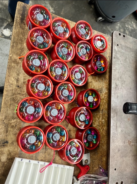 Batch of finished red gumball-machine yo-yos